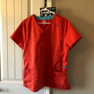 Orange and blue scrub top